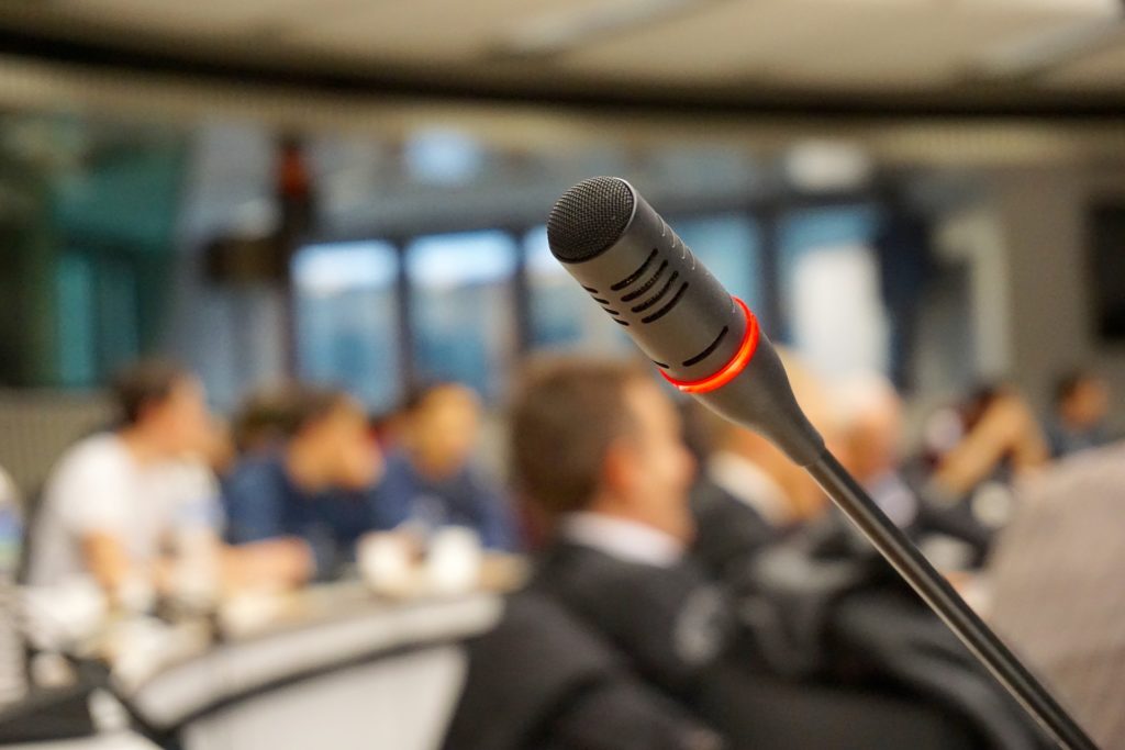 Microphone in front of a crowd