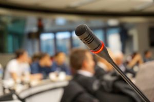 Microphone in front of a crowd