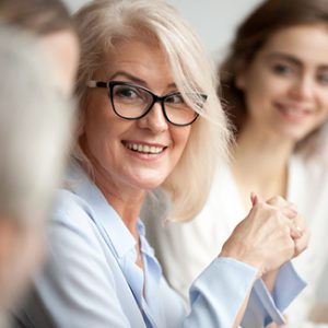 Woman smiling in meeting